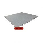 Dalle puzzle caoutchouc – 100 x 100 cm – Épaisseur 7 mm – Couleur gris clair moucheté – ERP Cfl-S2 – Indice COV A+