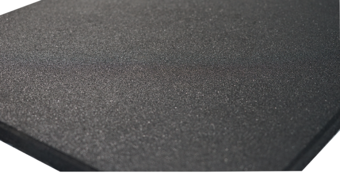 Surface texturée grise foncée avec grain fin.