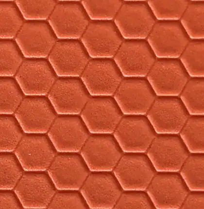 Texture hexagonale en relief de la surface d une dalle puzzle orange