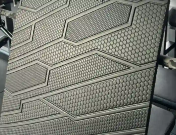 Surface moulee hexagonale d un tapis de gym en caoutchouc